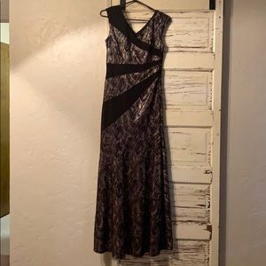 Sangria Long black and nude lace-look dress.